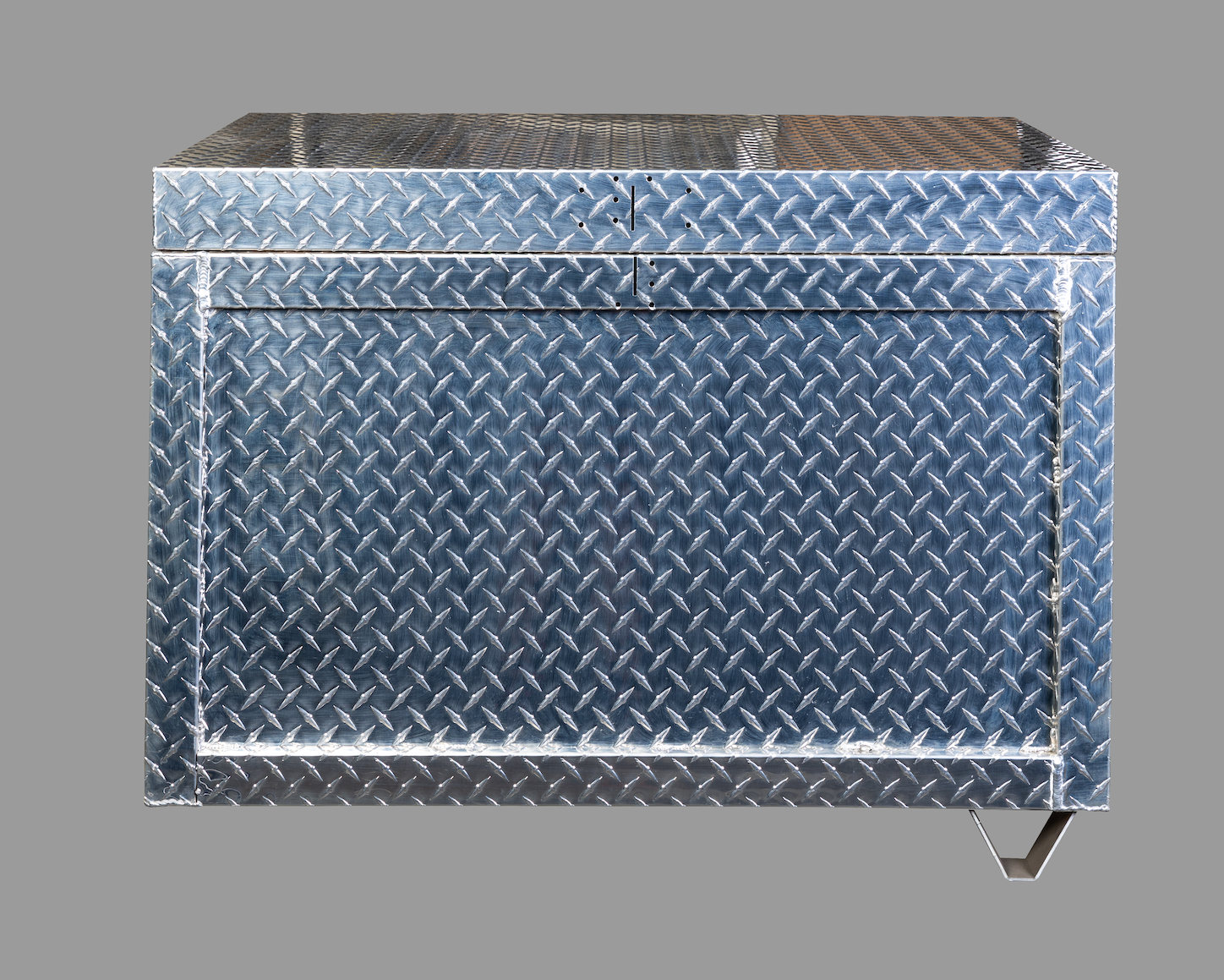 Diamond-plate aluminum storage chest, front view